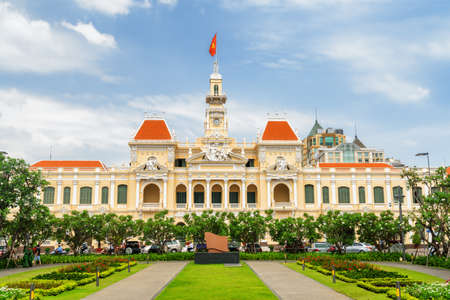 Facade of the Ho Chi Minh City Hall on blue sky background. Ho Chi Minh City is a popular tourist...