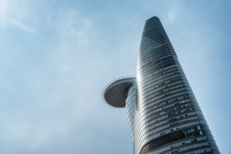 Ho Chi Minh City, Vietnam - February 23, 2017: The Bitexco Financial Tower with helipad on blue sky...