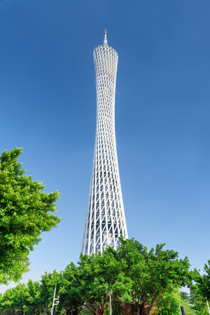 Guangzhou, China - September 16, 2017: Bottom view of the Canton Tower (Guangzhou TV, Astronomical and Sightseeing Tower) on blue sky background. The Canton Tower is a landmark tower of Guangzhou.のeditorial素材