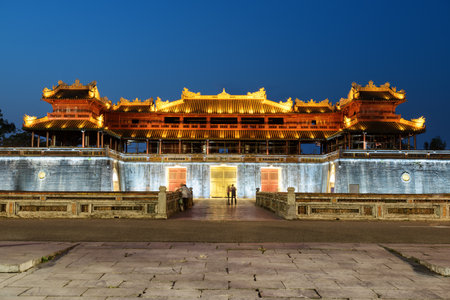 Beautiful evening view of the Meridian Gate to the Imperial City with the Purple Forbidden City within the Citadel in Hue, Vietnam. Hue is a popular tourist destination of Asia.のeditorial素材