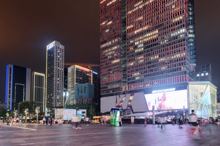 Chengdu, China - September 26, 2017: Scenic night view of Hongxing Road Walk Square with shopping malls at downtown. Chengdu is a popular tourist destination of Asia.のeditorial素材
