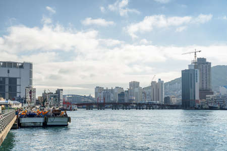 Amazing view of Busan in South Korea. Fishing vessels parked at the Port of Busan. Beautiful...