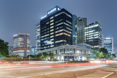 Seoul, South Korea - October 10, 2017: Scenic evening view of modern buildings and road at downtown....