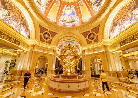 Macau - October 17, 2017: Fountain in lobby of the Venetian Macao. It is a luxury hotel, the famous shopping mall and the largest casino in the world. Beautiful interior.のeditorial素材