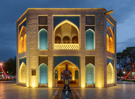 Kashan, Iran - 20 October, 2018: Wonderful evening view of colorful octagonal pavilion and bust of...