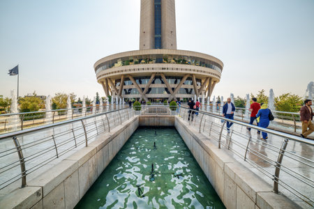 Tehran, Iran - 19 October, 2018: Beautiful view of fountains and entrance to Milad Tower. The tower is a popular tourist attraction of the Middle East.のeditorial素材