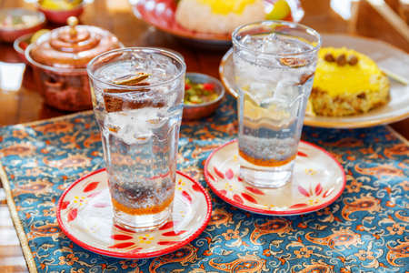Amazing traditional Iranian drinks. Sweet fragrant herbal distillates with chia seeds. Wonderful Persian cuisine.の写真素材