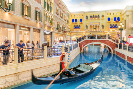 Macau - October 17, 2017: Scenic view of gondola on the San Luca Canal inside the Venetian Macao. It is a luxury hotel, the famous shopping mall and the largest casino in the world.