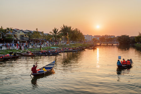 Hoi An (Hoian), Vietnam - April 11, 2018: Beautiful view of boats on the Thu Bon River at sunset.のeditorial素材