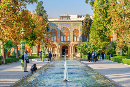 Tehran, Iran - 19 October, 2018: Tourists taking pictures of scenic fountains and walking along garden of the Golestan Palace. The Golestan Palace is a popular tourist attraction of the Middle East.のeditorial素材