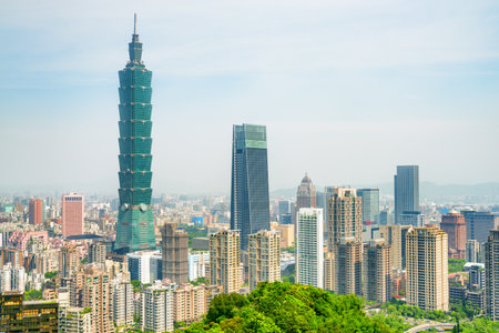 Amazing view of Taipei from top of mountain, Taiwan. Skyscrapers and other modern buildings of downtown. Scenic Taipei skyline. Amazing cityscape. Taiwan is a popular tourist destination of Asia.のeditorial素材