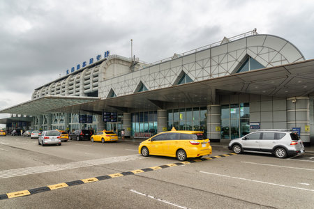 Kaohsiung, Taiwan - May 2, 2019: Facade of international passenger terminal at Kaohsiung International Airport (Xiaogang Airport). Taiwan is a popular tourist destination of Asia.のeditorial素材