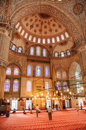 Istanbul, Turkey - July 20, 2009: Fabulous interior view of the Sultan Ahmed Mosque. Tourists and residents in the prayer hall. The Blue Mosque is a popular destination among pilgrims and tourists.のeditorial素材