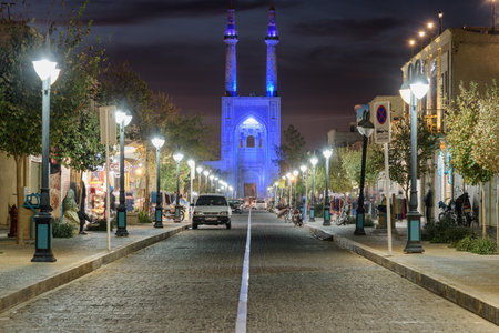 Yazd, Iran - 26 October, 2018: Awesome night view of Masjed Jame Street and the Jameh Mosque of Yazd. Azari style of Persian Islamic architecture at the ancient town.のeditorial素材