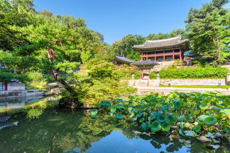 Awesome view of Juhamnu Pavilion and Buyeongji Pond in Huwon Secret Garden of Changdeokgung Palace in Seoul, South Korea. The garden is a popular tourist attraction of Asia.のeditorial素材
