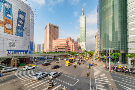 Taipei, Taiwan - April 26, 2019: Awesome evening view of intersection of Xinyi Road and Keelung Road at downtown. Taipei 101 (Taipei World Financial Center) is visible at right. Day traffic.のeditorial素材