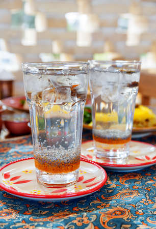 Cold traditional Iranian drink with chia seeds. Sweet fragrant herbal distillate. Amazing Persian cuisine.の写真素材