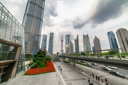 Shanghai, China - October 31, 2015: Scenic view of Century Avenue and the Oriental Pearl Tower in the Pudong New District (Lujiazui). Skyscrapers of downtown. Awesome cityscape.のeditorial素材