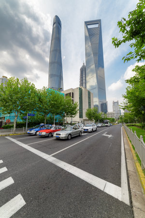 Shanghai, China - October 31, 2015: Scenic view of the Shanghai Tower, the Jin Mao Tower and the Shanghai World Financial Center (SWFC) at the Pudong New Area (Lujiazui).のeditorial素材