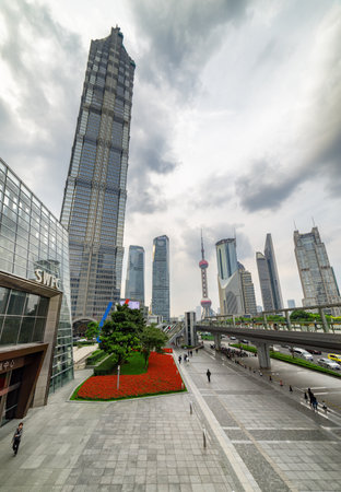 Shanghai, China - October 31, 2015: Awesome view of Century Avenue and the Jin Mao Tower in the Pudong New District (Lujiazui). Skyscrapers of downtown. Scenic cityscape.のeditorial素材