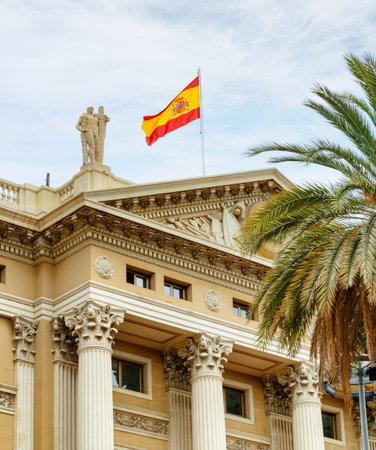 Barcelona, Spain - August 21, 2014: The Flag of Spain over the Military Government of Barcelona. Barcelona is a popular tourist destination of Europe.のeditorial素材