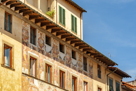 Florence, Italy - August 25, 2014: Awesome frescoes on facade of old building. Florence is a popular tourist destination of Europe.のeditorial素材