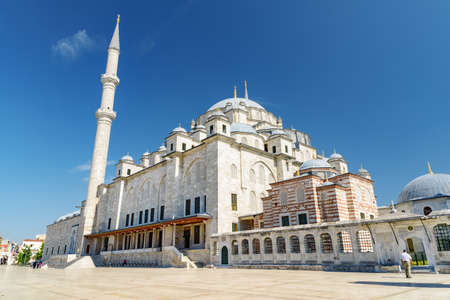 Awesome view of the Fatih Mosque in Istanbul, Turkey. The Ottoman imperial mosque is a popular destination among pilgrims and tourists of the world.の写真素材