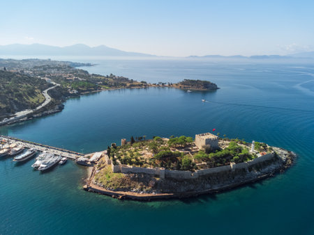 Aerial view of Guvercinada Island (Pigeon Island) with scenic castle at Kusadasi, Turkey. The large resort town is a popular tourist destination in Turkey.のeditorial素材