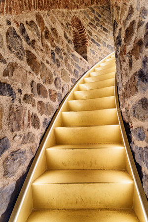 Unusual view of stairs leading to the top of the Galata Tower in Istanbul, Turkey. Narrow staircase inside the tower. Istanbul is a popular tourist destination of the world.のeditorial素材