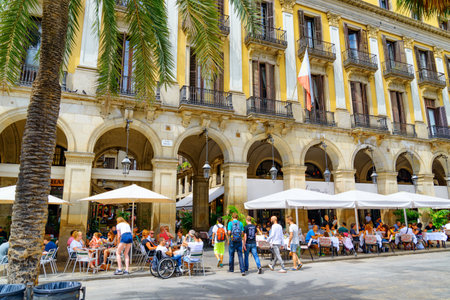 Barcelona, Spain - August 21, 2014: Scenic view of Placa Reial (Royal Plaza) in the Gothic Quarter. The square is a popular tourist attraction of Europe.のeditorial素材