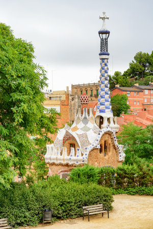 Awesome building at the entrance to the Park Guell in Barcelona, Spain. The park is designed by Antoni Gaudi. Barcelona is a popular tourist destination of Europe.のeditorial素材