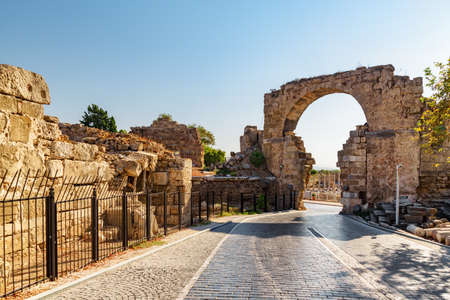 Awesome view of the Vespasian Gate in Side, Turkey. Amazing ruins of the ancient city are a popular tourist attraction of the world.の写真素材