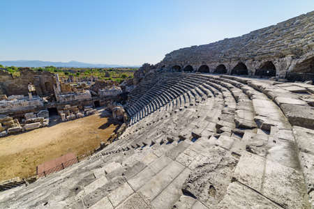 View of the ancient theatre in Side, Turkey. Side is a popular tourist destination in Turkey.の写真素材