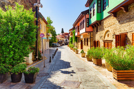 Scenic view of traditional Ottoman houses on an old street in Kaleici of Antalya, Turkey. The Kaleici area is the historic city center and a popular tourist attraction in Turkey.の写真素材