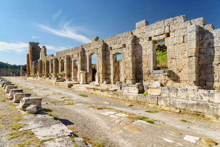 Scenic ruins of the Palace of Gaius Julius Cornutus in Perge (Perga) at Antalya Province, Turkey. Awesome view of the ancient Greek city. Perge is a popular tourist destination in Turkey.の写真素材