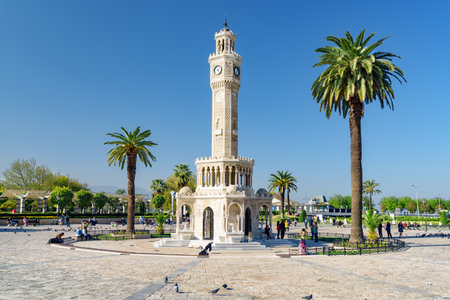 Izmir, Turkey - October 26, 2021: Scenic view of Izmir Clock Tower in the middle of Konak Square. The tower is the landmark of the port city.のeditorial素材