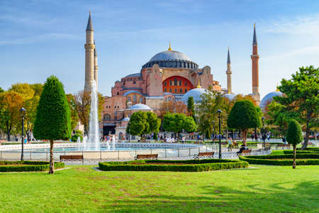 Fountain at Sultanahmet Square and the Hagia Sophia in Istanbul, Turkey. The Sultanahmet Square is a popular tourist attraction of Istanbul.の写真素材