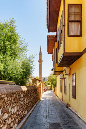 Scenic view of traditional Ottoman houses on an old street in Kaleici of Antalya, Turkey. The Kaleici area is the historic city center and a popular tourist attraction in Turkey.の写真素材