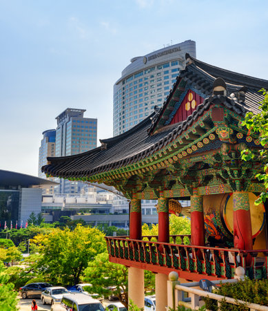 Seoul, South Korea - October 15, 2017: Colorful traditional Korean tile roof of Bongeunsa Temple and modern buildings at Gangnam District. Bongeunsa Temple is a popular tourist attraction of Asia.のeditorial素材