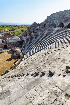 View of the ancient theatre in Side, Turkey. Side is a popular tourist destination in Turkey.の写真素材