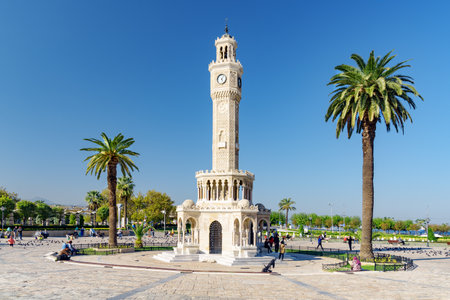 Izmir, Turkey - October 26, 2021: Scenic view of Izmir Clock Tower in the middle of Konak Square. The tower is the landmark of the port city.のeditorial素材