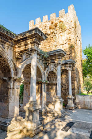Awesome view of Hadrian's Gate (Uckapilar) in Kaleici of Antalya, Turkey. The Kaleici area is the historic city center and a popular tourist attraction in Turkey.の写真素材