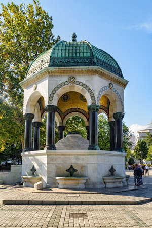 Awesome view of the German Fountain in Sultanahmet Square of Istanbul, Turkey. The ablution fountain is a popular tourist attraction in Turkey.の写真素材