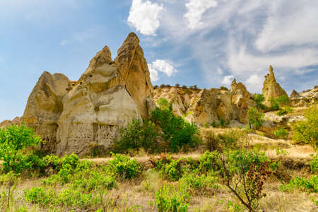 Awesome view of rock formations in the Love valley in Cappadocia, Turkey. Fabulous landscape of Goreme Historical National Park. Cappadocia is a popular tourist destination of Turkey.の写真素材