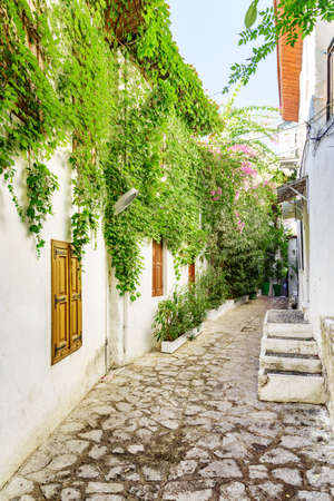 Awesome view of a cozy narrow street in Marmaris, Turkey. Scenic white houses of the old town. The port city is a popular tourist destination in the Turkish Riviera.の写真素材