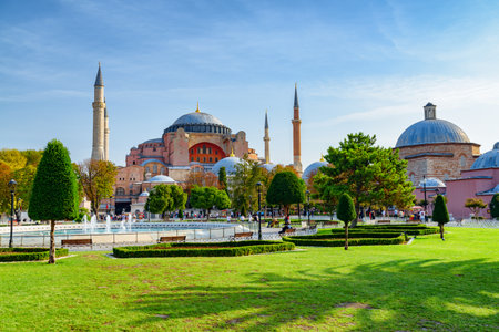 Fountain at Sultanahmet Square and the Hagia Sophia in Istanbul, Turkey. The Sultanahmet Square is a popular tourist attraction of Istanbul.の写真素材