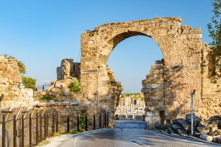 Awesome view of the Vespasian Gate in Side, Turkey. Amazing ruins of the ancient city are a popular tourist attraction of the world.の写真素材