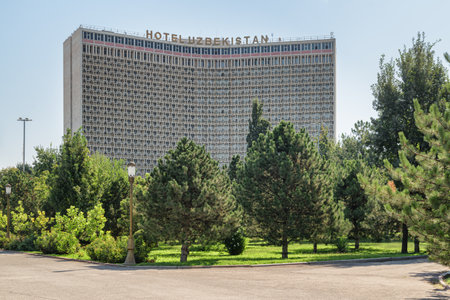 Tashkent, Uzbekistan - 8 September, 2022: Awesome view of facade of Hotel Uzbekistan. The famous hotel located on the Amir Timur Square. Tashkent is a popular tourist destination of Central Asia.のeditorial素材