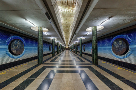 Awesome space themed decorations of Kosmonavtlar Station of the Tashkent Metro in Tashkent, Uzbekistan. The amazing underground lobby is a popular tourist attraction of Central Asia.のeditorial素材