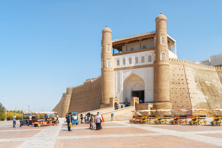 Bukhara, Uzbekistan - September 4, 2022: Awesome view of the Ark of Bukhara. The massive ancient fortress is a popular tourist attraction of Central Asia.のeditorial素材